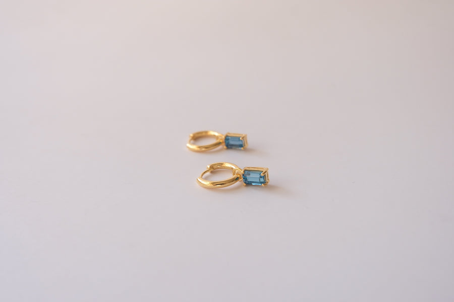 Dangling hoops with Emerald Cut birthstone charm