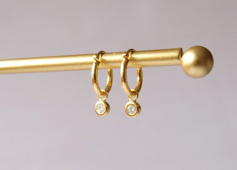 0.10 Natural Diamond Dangling Earrings