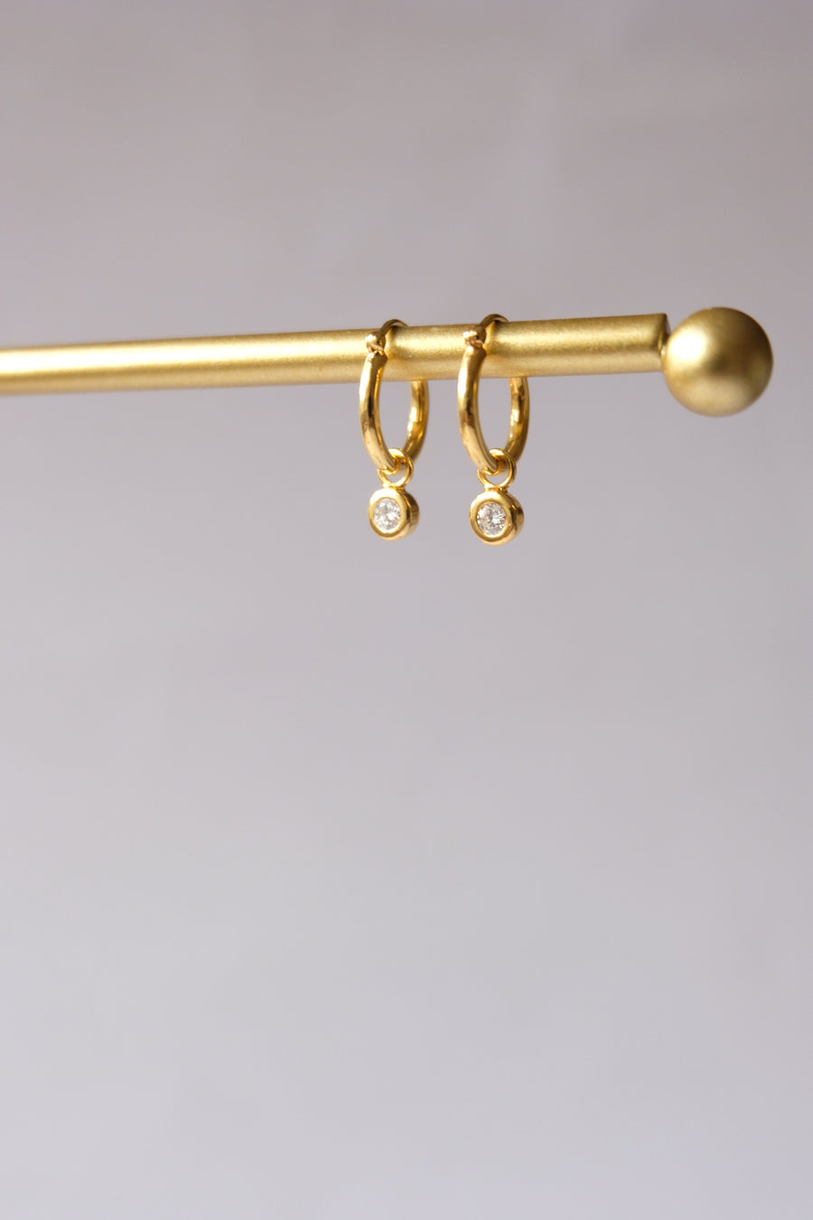 0.10 Natural Diamond Dangling Earrings