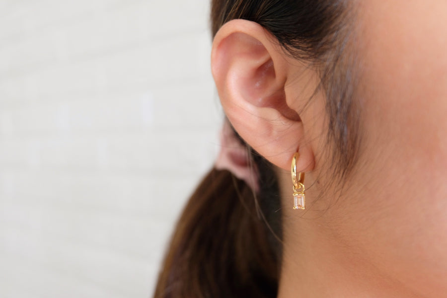 Dangling hoops with Emerald Cut birthstone charm