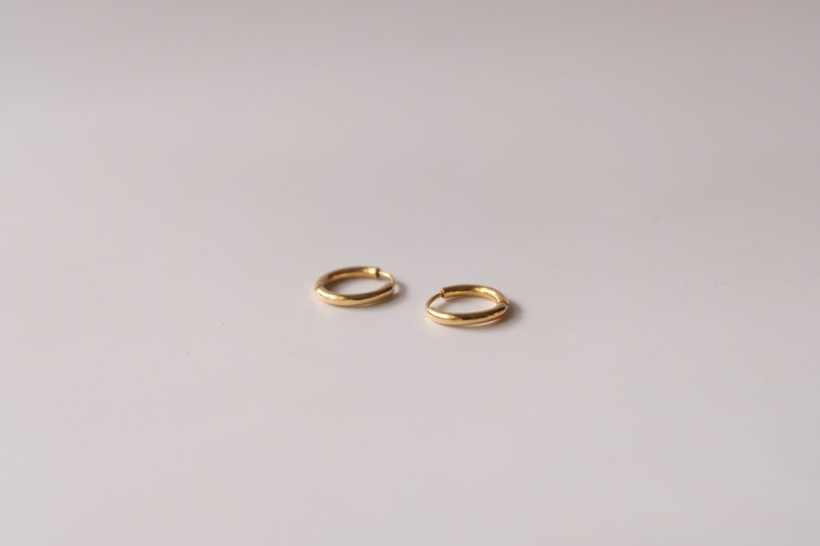 Dangling hoops with Emerald Cut birthstone charm