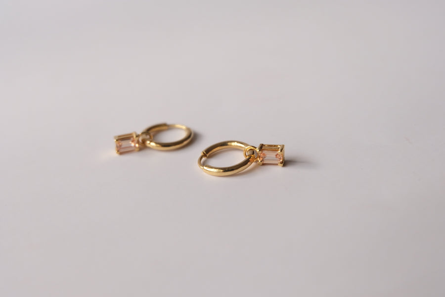 Dangling hoops with Emerald Cut birthstone charm