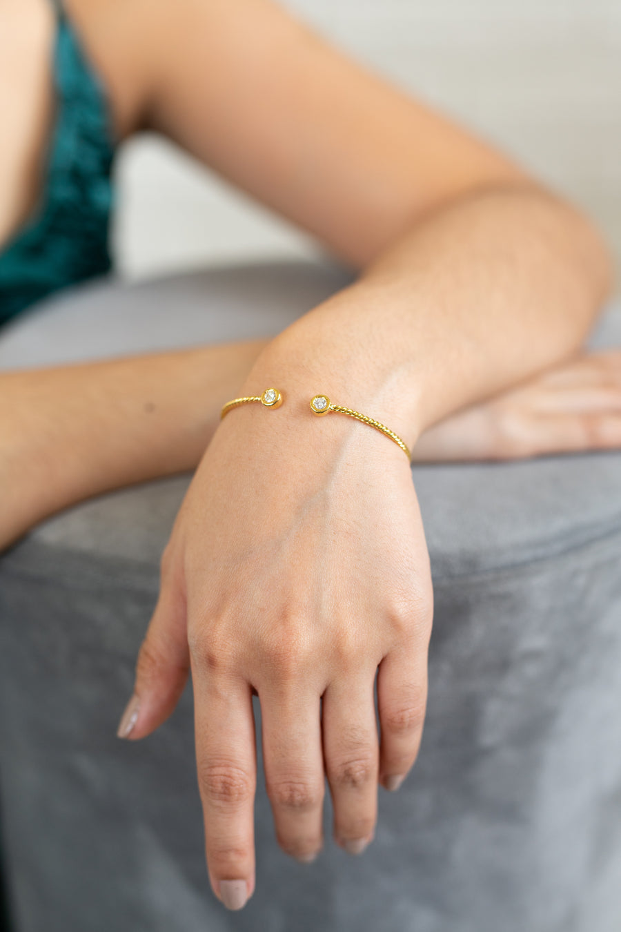 14 Karat Twisted Bangle with Natural Diamonds