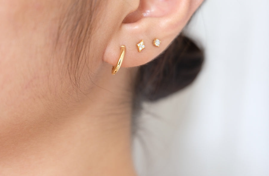 14 Karat Reversible Plain/Twisted Hoops (per piece)